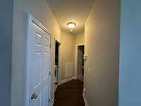 Hallway to master and laundry room