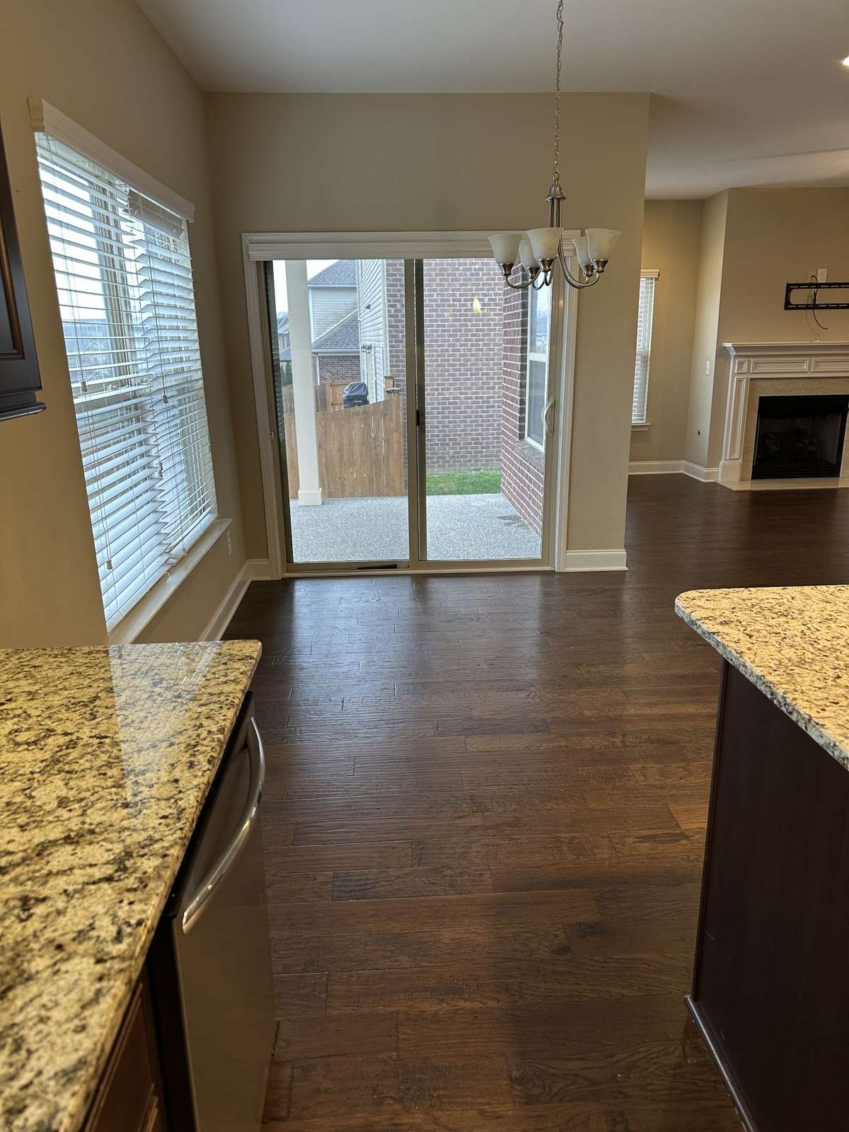 KITCHEN LOOKING OUT TO COVERED PORCH