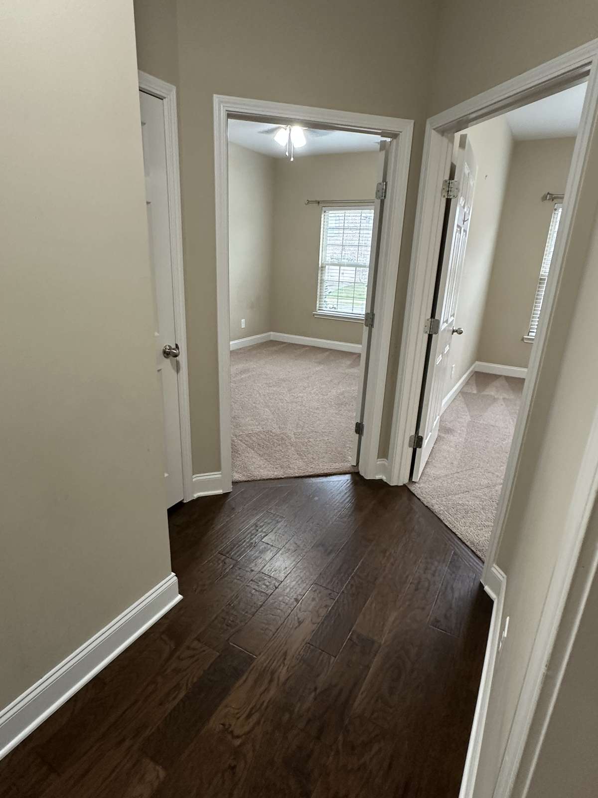 HALL OFF OF BED ROOMS