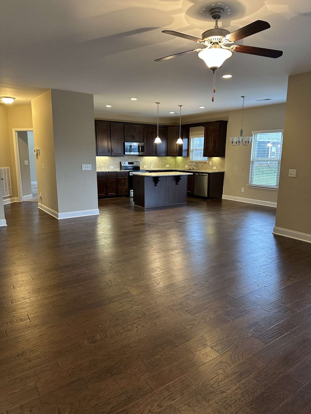 LIVING ROOM LOOKING INTO KITCHEN