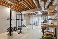 Partially finished flex space. Currently used as home gym!