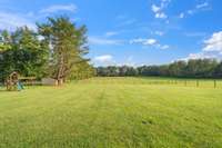 Top acreage is fully fenced & ready for playtime!