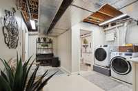 Basement level laundry space