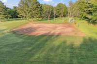 Softball or up to 10u baseball practice field w/ permanent bases & fenced backstop!