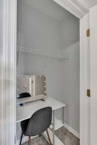 Primary Bath features and EXTRA CLOSET!  This can he "his" or used for your linens.