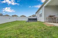 1113 Woodbridge Glen also comes with this incredible hot tub!  Relax in comfort and in privacy!