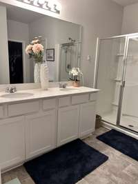 The Primary Bathroom is spacious with 2 sinks, and two closets!