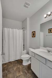 Full bathroom is located between bedrooms 2 & 3 just off the hallway.