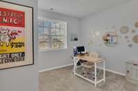Bedroom 2 is currently used as an office. This room is street facing