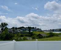 This is my beautiful serene back yard view! Vast common ground with pond down in the valley.