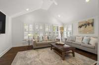 Adjacent to the den is a great space currenty being used as another lounge area - wall of windows lets in natural light. This space could also be considered a bedroom as there is a full bath attached
