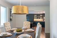 A peek into the stylishly renovated kitchen from the dining room