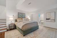 On the main level is the impressive primary suite. Step down into a ton of space for creating a true retreat!