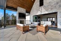 Cozy up in front of the wood burning fireplace (gas starter). All the conveniences of comfort with a motorized patio sunshade! The paradigm speakers will ensure you can enjoy the sound of your favorite movie, football game or music!