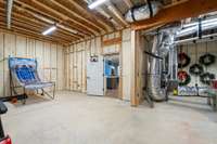 The unfinished basement could be the future home of your golf simulator?! But at this time it remains the home of the Bosch tankless water heater and the mechanics that keep this home running efficiently!