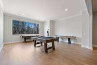 Natural light and tall ceilings, allowing you to forget you are in a basement!