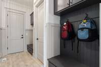 Custom storage and hooks as you come in the garage for convenience from the everyday in and outs!