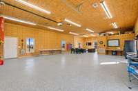 30x50 Workshop with central HVAC system, full bathroom, hookups for kitchen and washer and dryer, RV hook-up, welder outlet, 12' garage door, 3 pedestrian doors, keyless entry and smart thermostats.