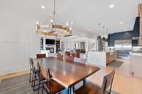Dining room still offers an intimate space without pulling away from the rest of the home.