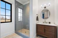 The guest bathroom on the main floor offers a walk-in shower!
