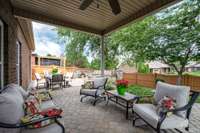 ...to this Awesome covered Patio area with a ceiling fan!