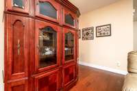 Seller prefers to leave Armoire in the Living Room