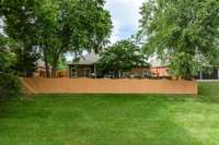 View from common area shows attractive privacy fence