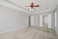 Primary Bedroom with bathroom suite.