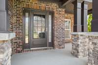 Relax on the large covered and inviting front porch.