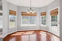 Breakfast nook features lots of windows.