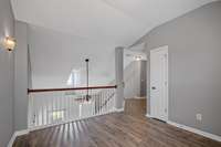 Loft space looking over main living area offers potential for an additional living space, office, hobby room, play area, gaming space......