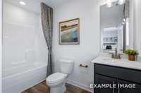 The secondary suite's ensuite bathroom is perfect for roommates or guests.