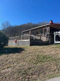 LARGE DECK OFF SCREENED PORCH TO HOUSE