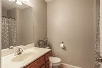 Full bath in hallway between Bedroom #2 and Bedroom #3