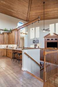 View of the stairs from the kitchen to the walkout basement and garage.