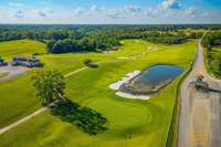 View of the golf course and the gate house for the community.