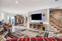 Look at this fantastic living room/game room in the walkout basement!
