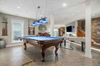 Pool table and air hockey table both convey.
