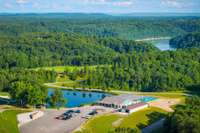 Located in the prestigious Honky Tonk National Golf community that offers a championship 18 hole golf course designed by PGA professional Peter Jacobsen and architect Jim Hardy, clubhouse with restaurant and bar, pickleball courts and driving range.