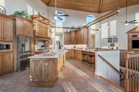 View from the breakfast nook showcases the abundant cabinetry and countertops.