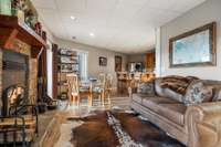 View to the wet bar and dining area/game table.