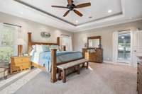 Trey ceiling, multiple windows to let in the sunshine, and higher-end luxury carpet complement the primary suite.