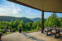 View to the firepit from the lower covered patio.