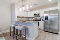Stainless steel appliances convey.