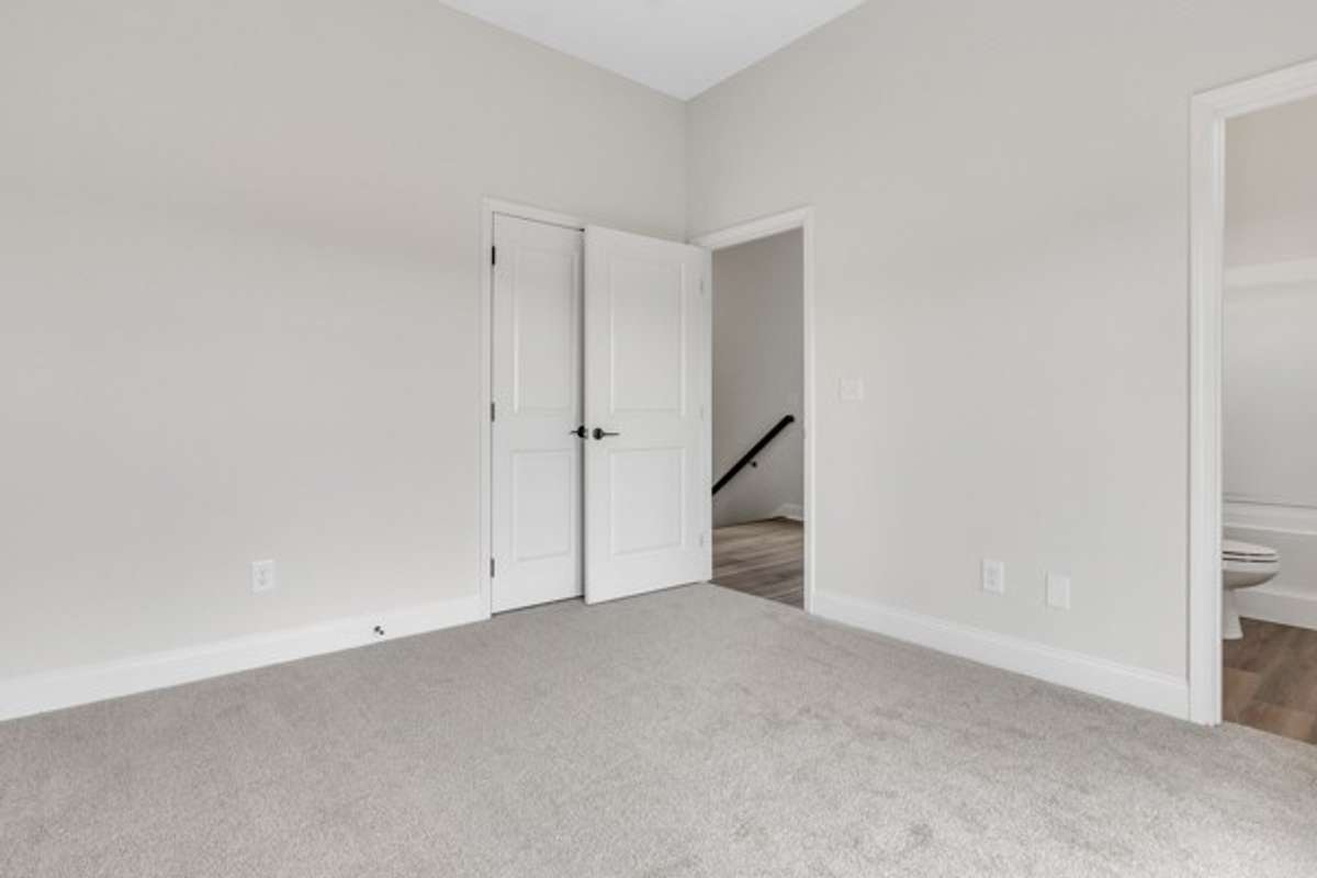 A look back through 3rd floor guest room from private deck french doors.