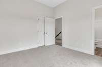 A look back through 3rd floor guest room from private deck french doors.