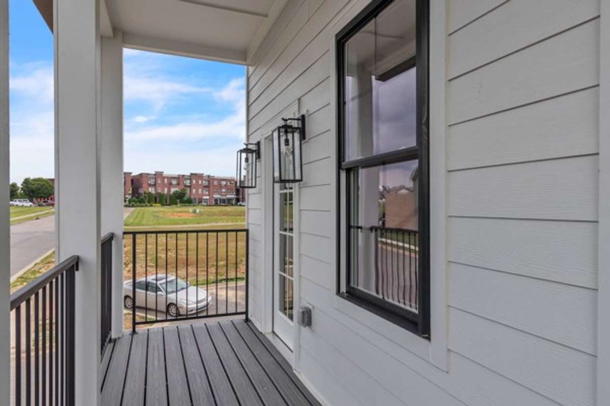 Another shot of the guest balcony with a view of your soon-to be favorite neighborhood restaurants!