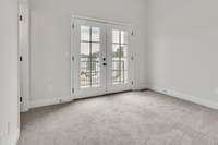 Your guests will feel extra pampered in this 3rd floor guest room with double doors to their own private balcony and private guest bath.