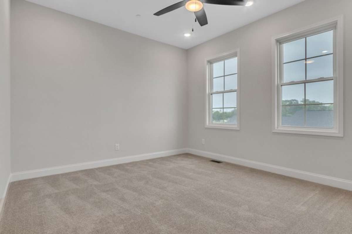 This room is large! With 10 ft ceilings, great lighting and 3 windows the is a perfect owner's retreat from which to start and end the day.