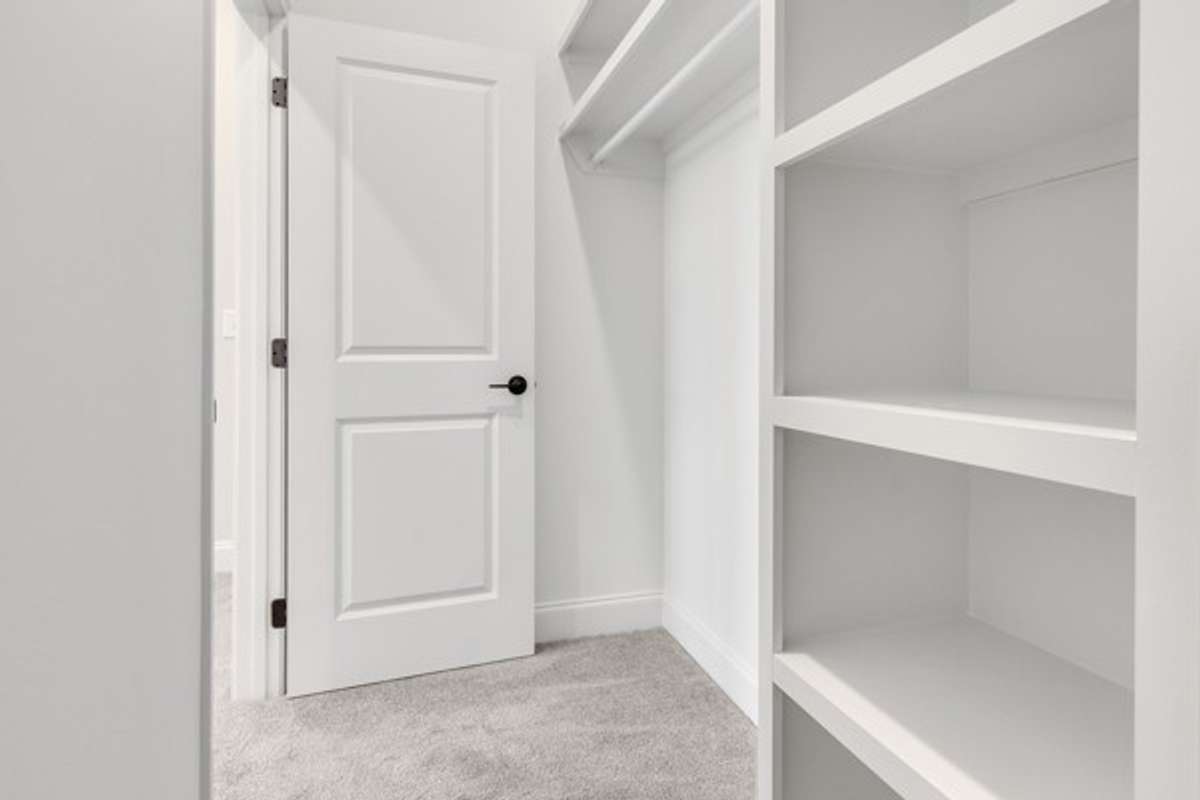 Another angle of owner's closet.